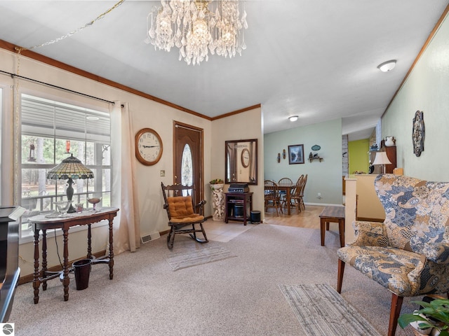 carpeted living area featuring baseboards, a notable chandelier, and visible vents