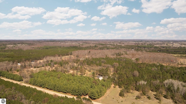 view of landscape with a forest view
