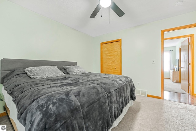 7276 Tiger Dr Unit A, And B, Lake Ann, MI 49650 - carpeted bedroom with a ceiling fan, baseboards, and visible vents