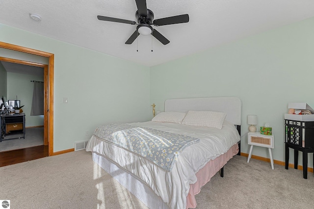 7276 Tiger Dr Unit A, And B, Lake Ann, MI 49650 - carpeted bedroom with visible vents, a ceiling fan, and baseboards