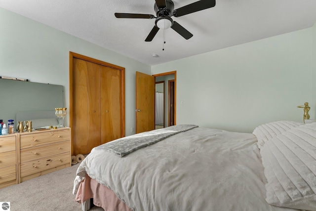 7276 Tiger Dr Unit A, And B, Lake Ann, MI 49650 - bedroom with a closet, carpet, and a ceiling fan