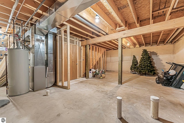 7276 Tiger Dr Unit A, And B, Lake Ann, MI 49650 - unfinished below grade area featuring heating unit and gas water heater