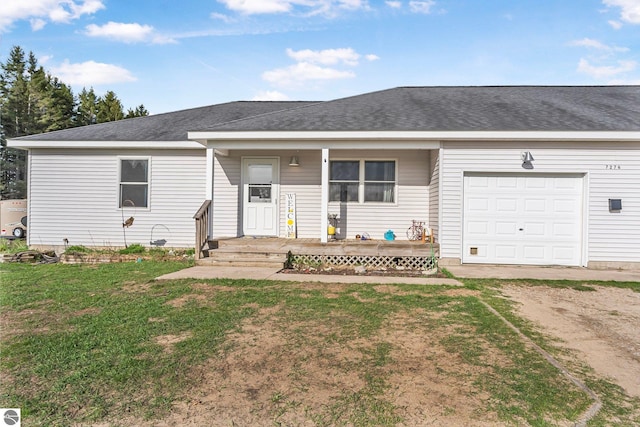 7276 Tiger Dr Unit A, And B, Lake Ann, MI 49650 - ranch-style home with covered porch, driveway, a front yard, and a garage