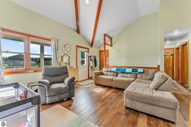 7276 Tiger Dr Unit A, And B, Lake Ann, MI 49650 - living area featuring baseboards, beamed ceiling, high vaulted ceiling, and wood finished floors