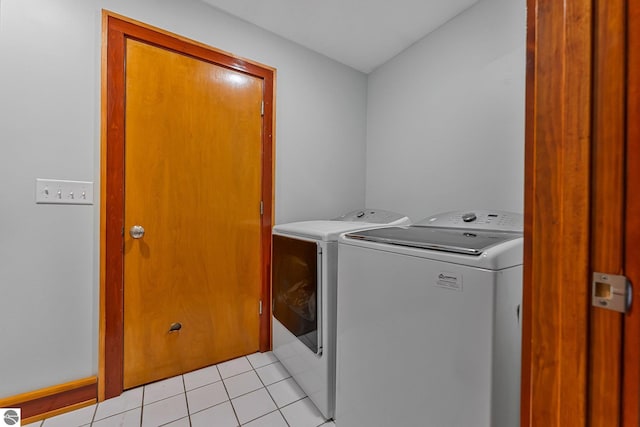 7276 Tiger Dr Unit A, And B, Lake Ann, MI 49650 - clothes washing area with laundry area, independent washer and dryer, and light tile patterned floors