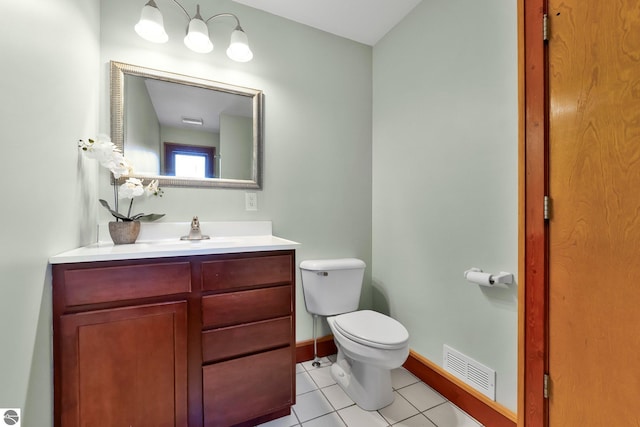 7276 Tiger Dr Unit A, And B, Lake Ann, MI 49650 - bathroom featuring visible vents, tile patterned floors, baseboards, vanity, and toilet
