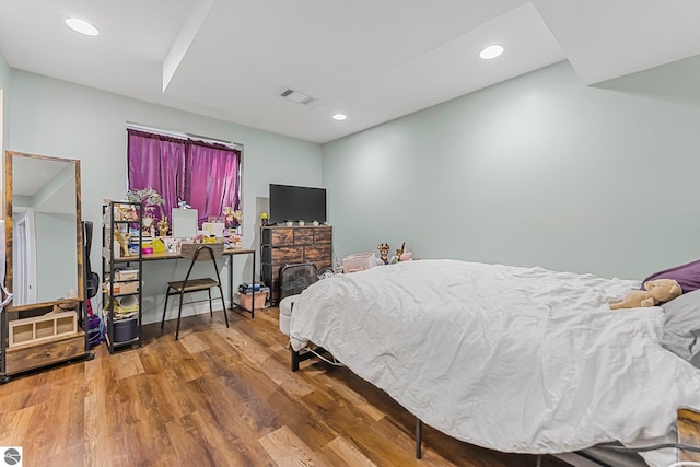 7276 Tiger Dr Unit A, And B, Lake Ann, MI 49650 - bedroom featuring recessed lighting, visible vents, and wood finished floors