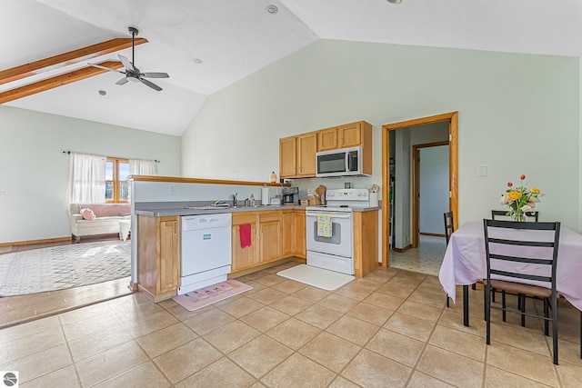 7276 Tiger Dr Unit A, And B, Lake Ann, MI 49650 - kitchen featuring ceiling fan, high vaulted ceiling, a peninsula, open floor plan, and white appliances