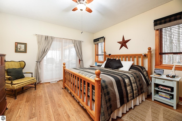 bedroom featuring ceiling fan and light wood-style flooring