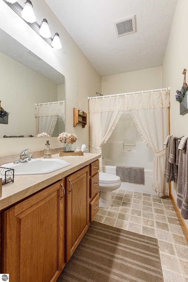 bathroom with vanity, toilet, a textured ceiling, shower / bath combination with curtain, and visible vents
