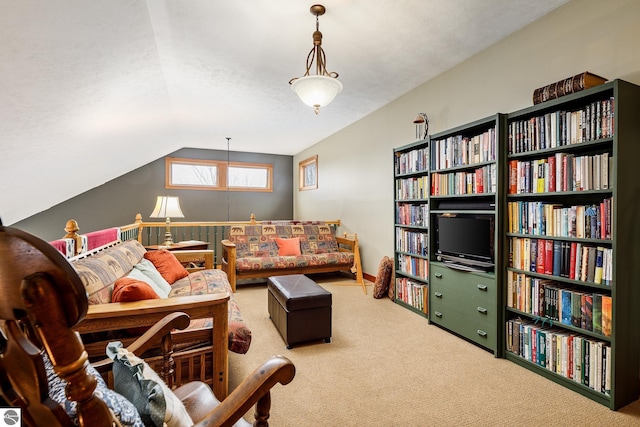 carpeted living room featuring lofted ceiling