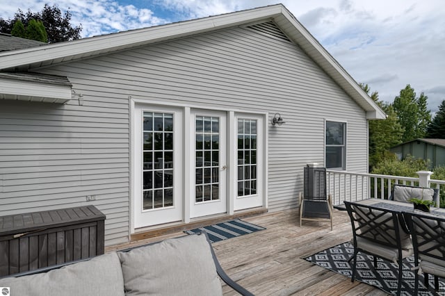 4215 Hearthside Dr, Traverse City, MI 49684 - deck featuring outdoor dining space