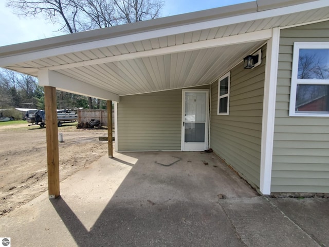 view of patio featuring a carport