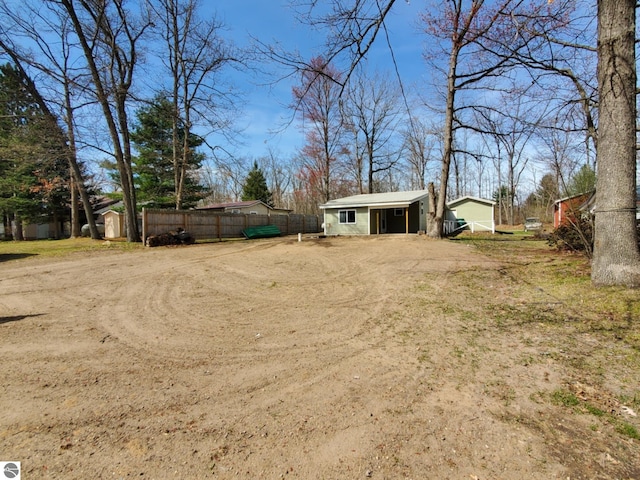 view of yard with fence