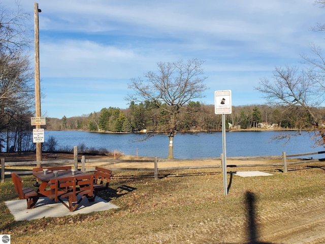 property view of water with fence