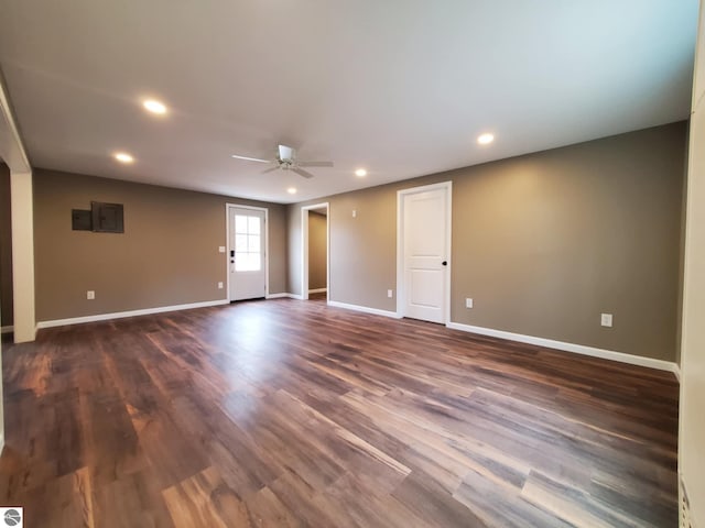 unfurnished room featuring dark wood finished floors, baseboards, a ceiling fan, and recessed lighting