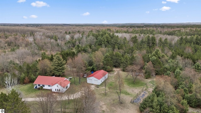 drone / aerial view with a view of trees