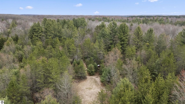 bird's eye view featuring a forest view