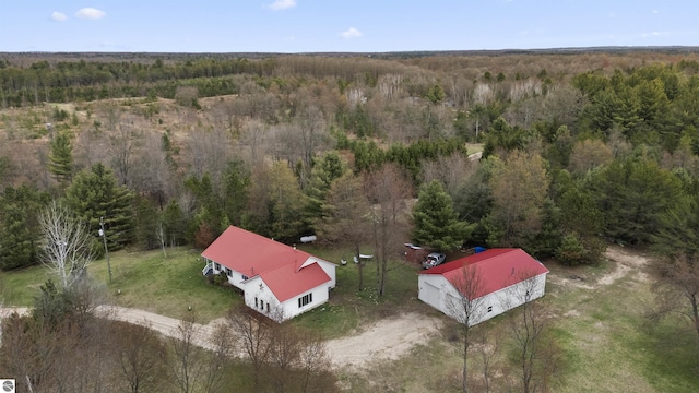 bird's eye view with a forest view