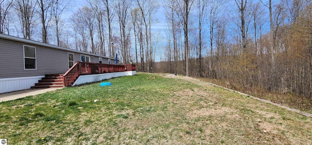 view of yard with a deck