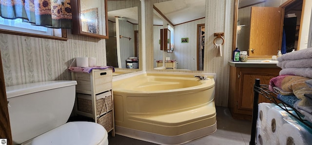 bathroom with a garden tub, toilet, tile patterned flooring, lofted ceiling, and vanity