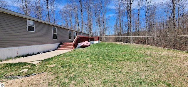 view of yard with a deck