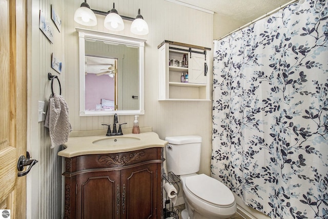 7809 Potter Rd, Bear Lake, MI 49614 - bathroom featuring toilet, a shower with shower curtain, and vanity