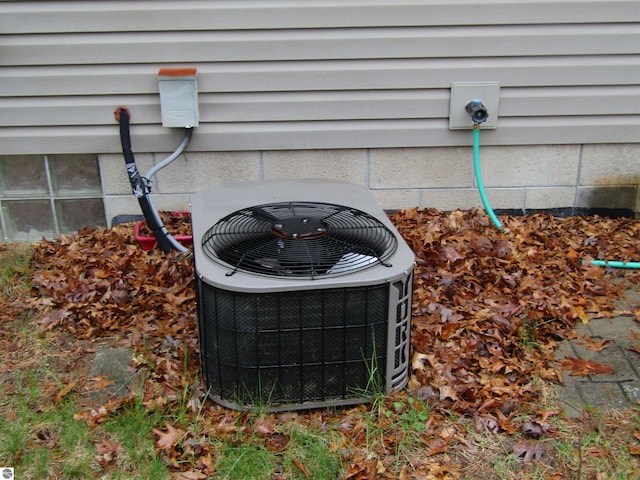 exterior details featuring central AC