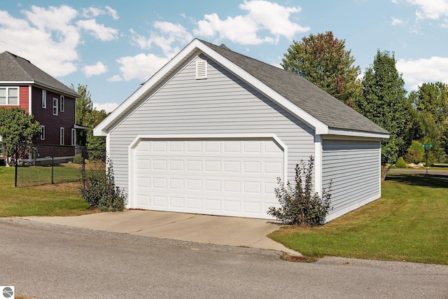 detached garage with fence
