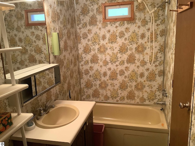 full bathroom with vanity, plenty of natural light, and shower / bath combination