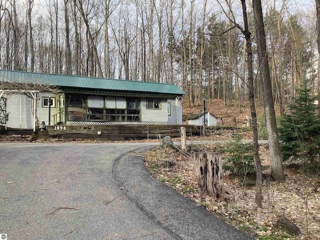 view of front of home with metal roof