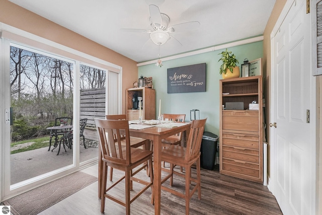 715 Lake Ave Unit 17-C, Traverse City, MI 49684 - dining space with a ceiling fan and wood finished floors