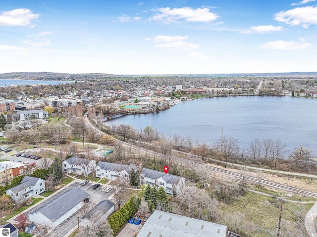 715 Lake Ave Unit 17-C, Traverse City, MI 49684 - bird's eye view featuring a water view and a residential view