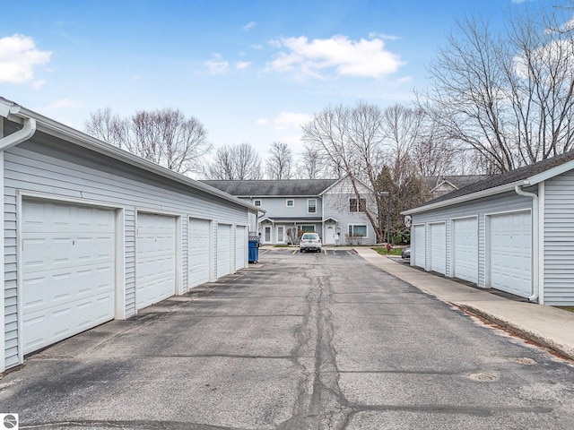 715 Lake Ave Unit 17-C, Traverse City, MI 49684 - view of street with community garages and a residential view