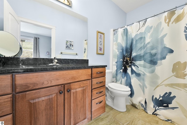 4620 Black Bear Dr Unit 49, Traverse City, MI 49685 - bathroom featuring toilet, vanity, and a shower with curtain
