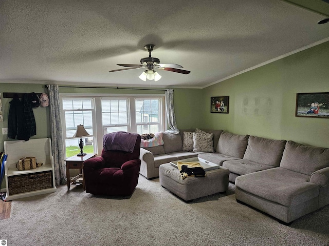 carpeted living area featuring crown molding, a textured ceiling, lofted ceiling, and ceiling fan