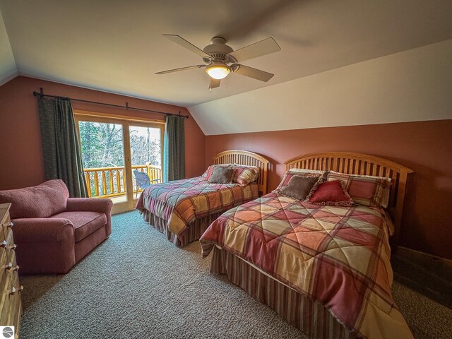 9184 S M-37, Wellston, MI 49689 - bedroom with a ceiling fan, vaulted ceiling, access to exterior, and carpet floors