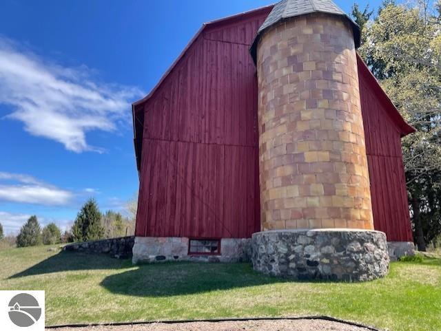 3312 Zimmerman Rd, Traverse City, MI 49685 - view of barn with a lawn