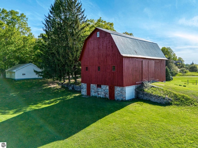 3312 Zimmerman Rd, Traverse City, MI 49685 - view of barn with a lawn