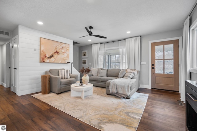 7555 Anthony St, Fife Lake, MI 49633 - living area featuring ceiling fan, dark wood-type flooring, recessed lighting, and baseboards