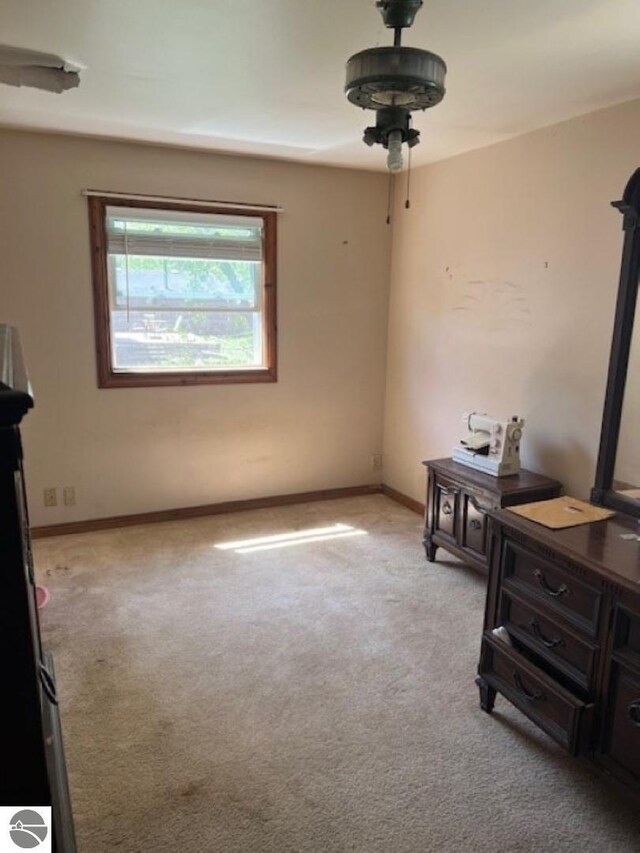 394 Wilson Ave, Mount Morris, MI 48458 - bedroom featuring light colored carpet and baseboards