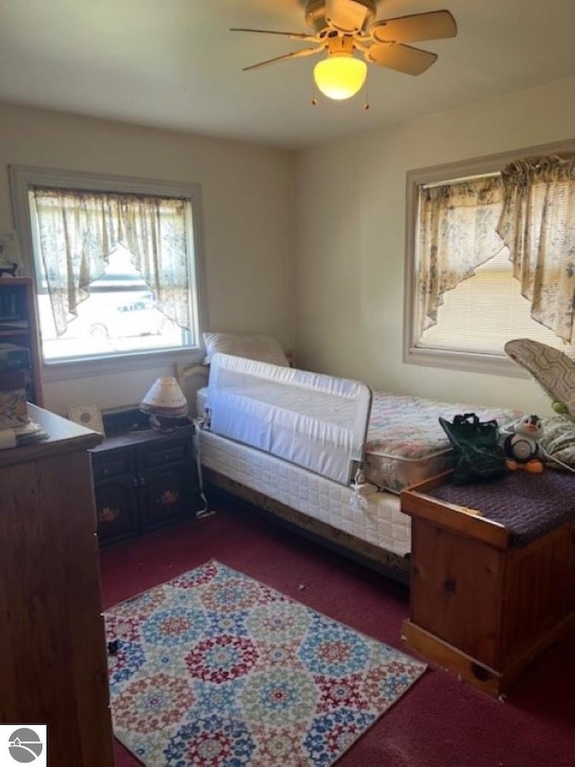 394 Wilson Ave, Mount Morris, MI 48458 - carpeted bedroom featuring ceiling fan