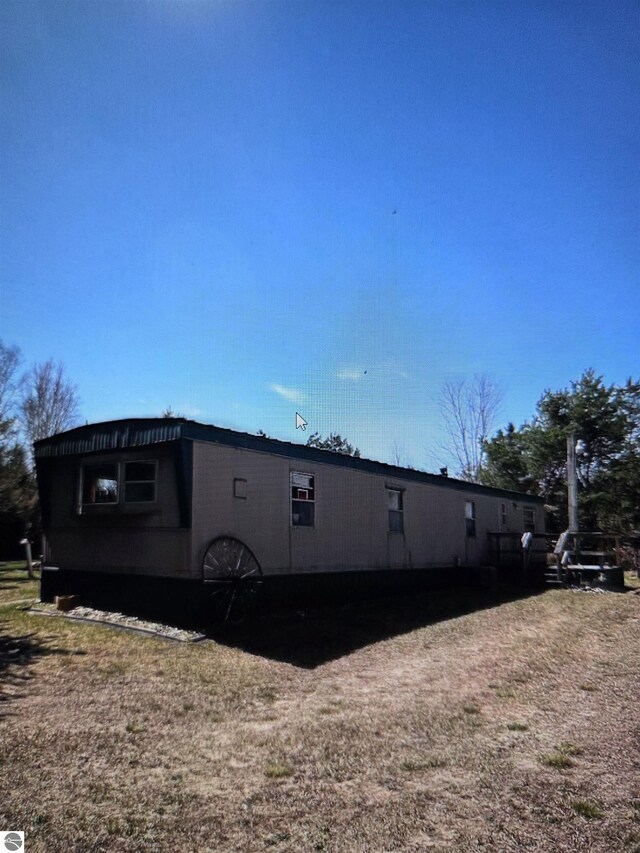 4151 Fraser Rd, Glennie, MI 48737 - view of side of home
