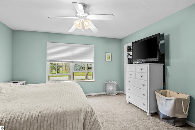 8565 Bent Pine Dr, Lake Ann, MI 49650 - carpeted bedroom featuring baseboards and ceiling fan