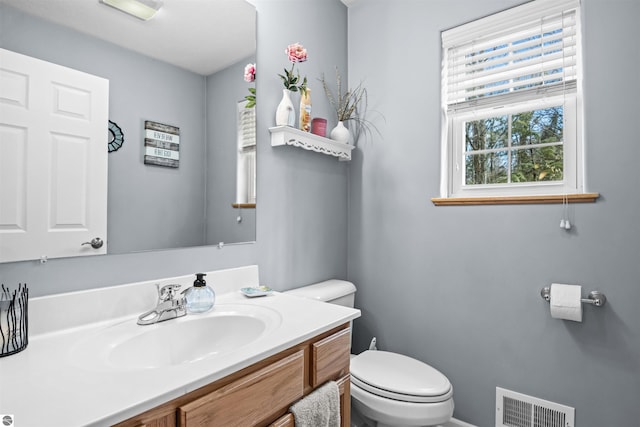 8565 Bent Pine Dr, Lake Ann, MI 49650 - bathroom with toilet and vanity