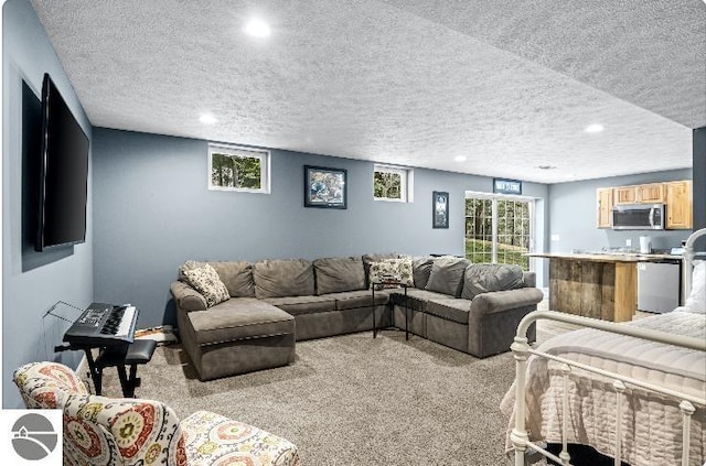 8565 Bent Pine Dr, Lake Ann, MI 49650 - carpeted living room featuring recessed lighting and a textured ceiling