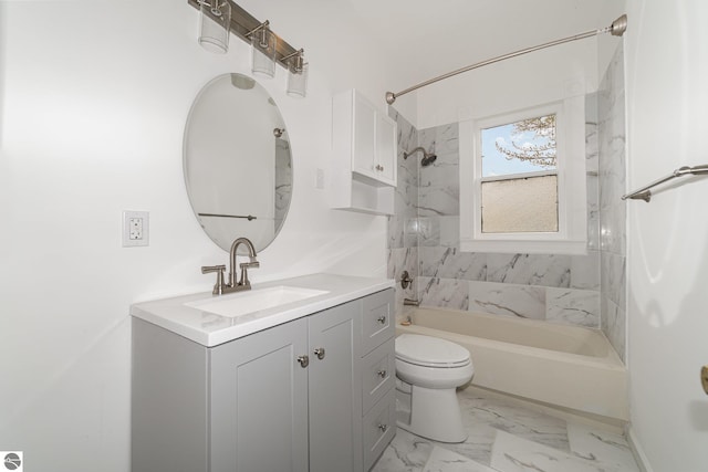 117 S Fancher St, Mount Pleasant, MI 48858 - bathroom with bathing tub / shower combination, toilet, vanity, and marble look tile flooring