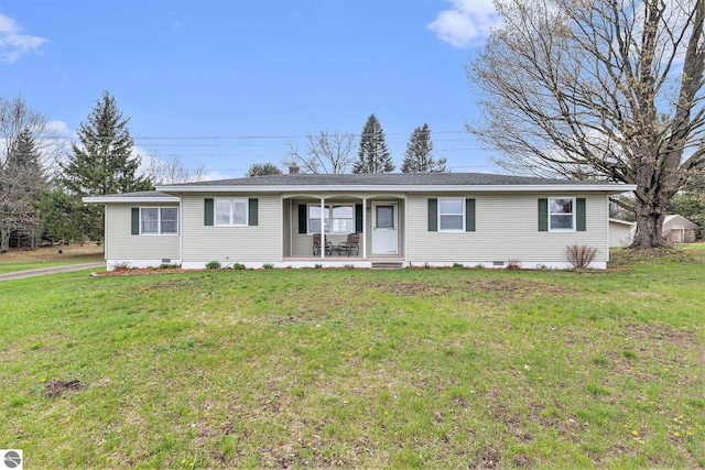 4120 M-66, Kalkaska, MI 49646 - ranch-style home with crawl space, a porch, a front lawn, and a chimney
