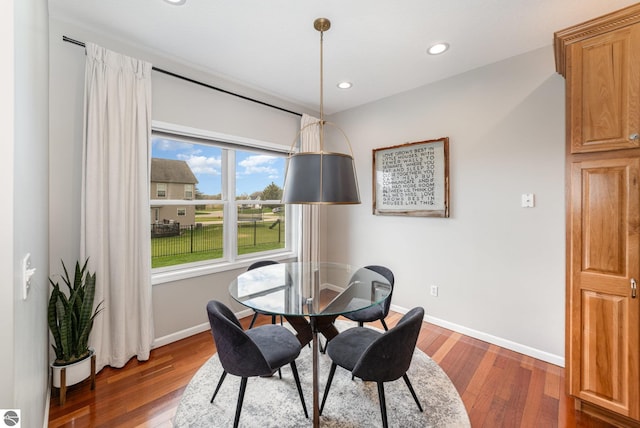 726 Doe Trl, Mount Pleasant, MI 48858 - dining space featuring wood finished floors, baseboards, and recessed lighting