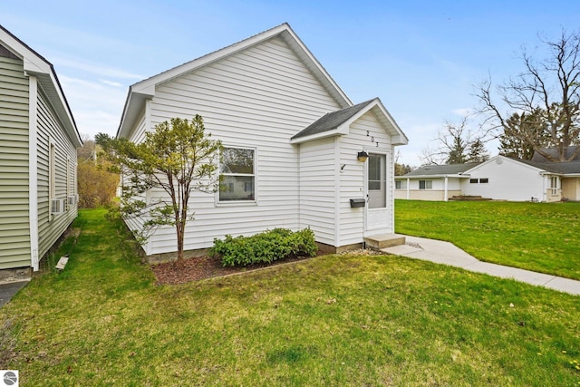 203 W Sixteenth St, Traverse City, MI 49684 - view of front of property with a front yard and entry steps